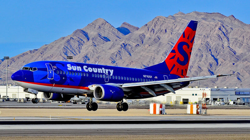 sun country airlines carry on size